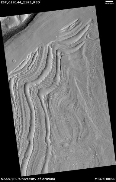 Mars Reconnaissance Orbiter recorded images of numerous gullies on Mars's surface which appeared to have been formed by water. Image credit: NASA.