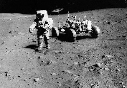 Apollo image of astronaut and Moon buggy