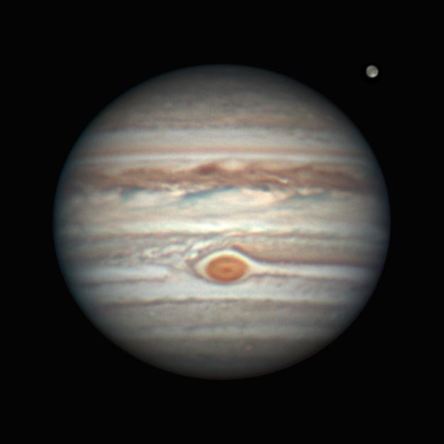 Jupiter with Ganymede to its upper right (Image courtesy Geof Lewis).