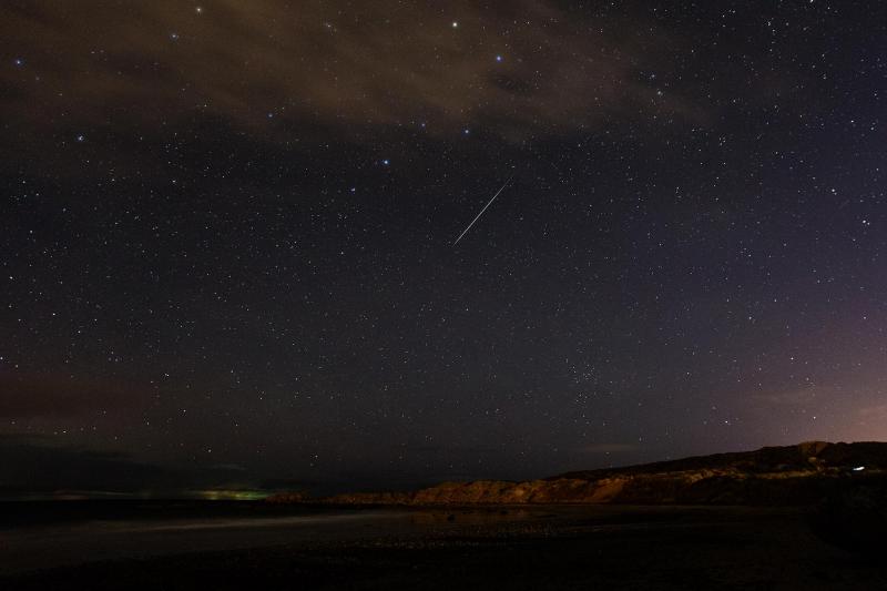 A meteor flashes across the sky near the Plough (Image courtesy Alan C. Tough).