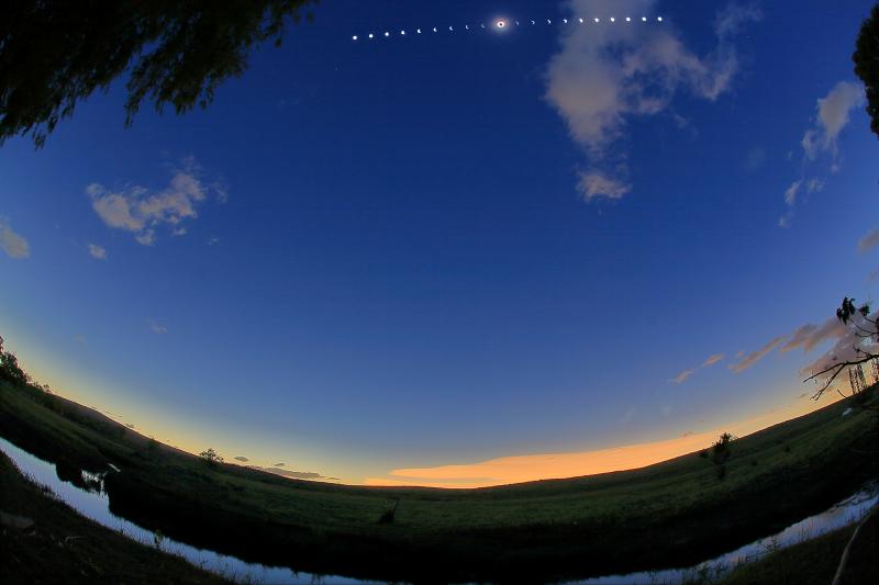 Eclipse progress composite. This and all other eclipse images are approximately zenith-up. (Philippe Lopez)