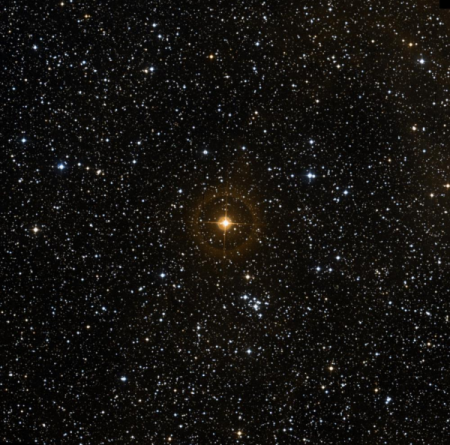 The star RW Cephei is central and distinctly reddish in colour