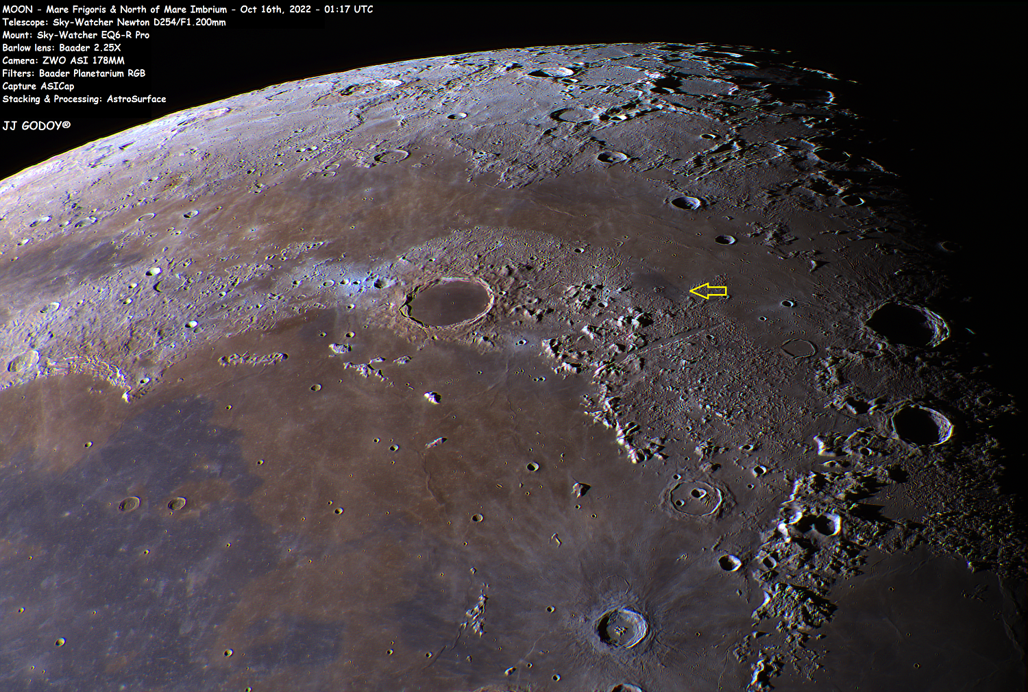 Mare Imbrium and Mare Frigoris, with a location marked with a yellow arrow east (IAU definition) of Plato